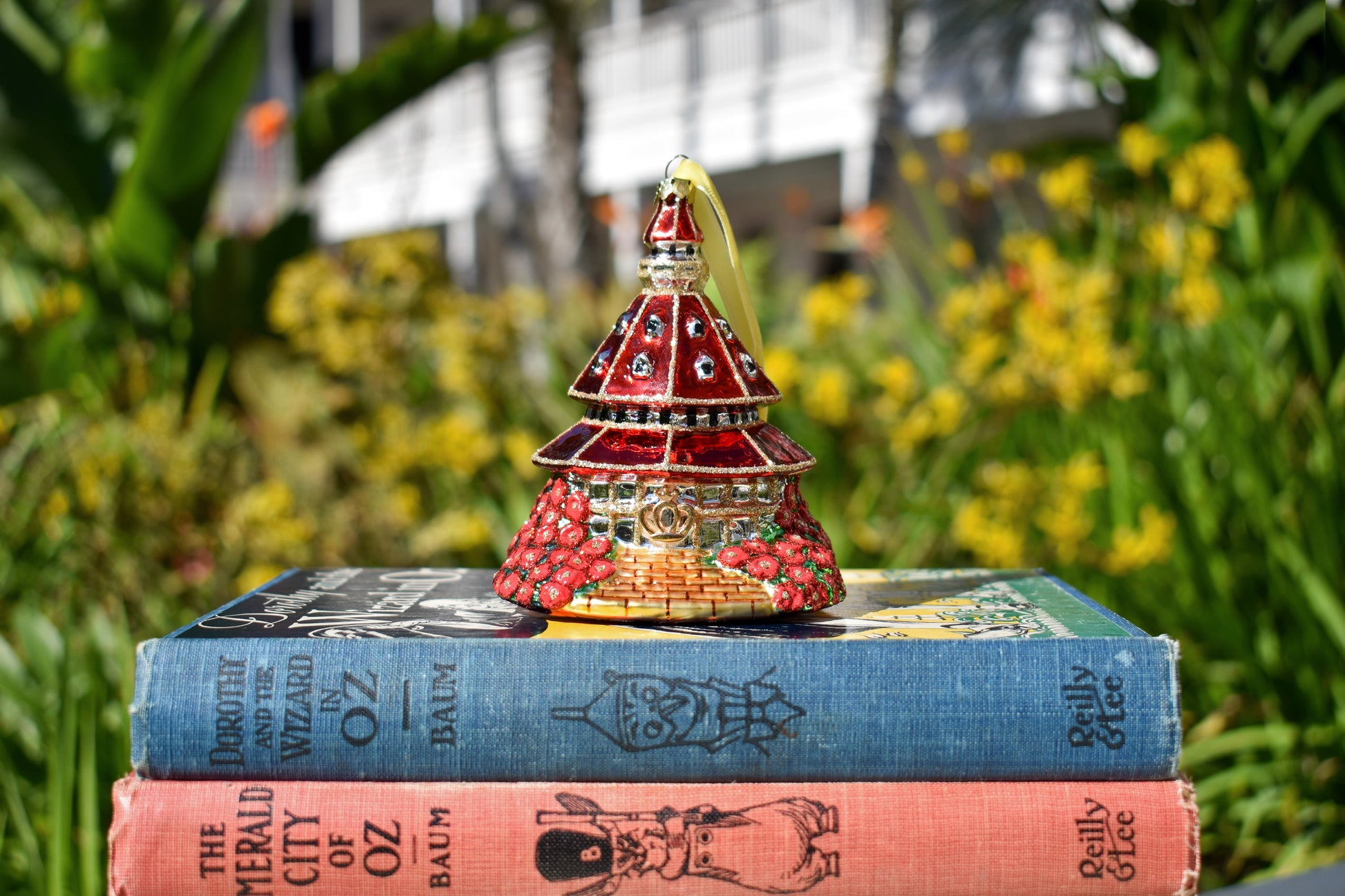 Hotel del Coronado ornament on a stack of Wizard of Oz books